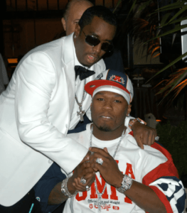 Diddy and 50 Cent during Universal Music Group's Grammy Reception at The Palm Restaurant in Los Angeles, California, United States. Credit: Denise Truscello/ WireImage for Universal Music Group