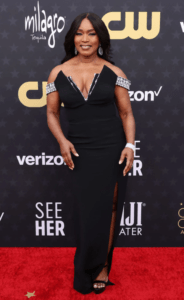 Angela Bassett stunned in a black Pamella Roland dress adorned with bejeweled shoulder details at the Critics Choice Awards, Credit: supplied.