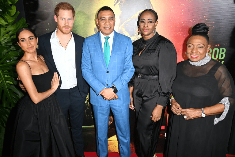 Meghan Markle and Prince Harry posed for photos with posed for photos with Jamaican Prime Minister Andrew Holness and his family. Credit: Getty Images for Paramount Pictures.