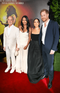 The couple is seen with Brian Robbins, the president and CEO of Paramount Pictures and Nickelodeon, alongside his wife Tracy James. Credit: Getty Images for Paramount Pictures.