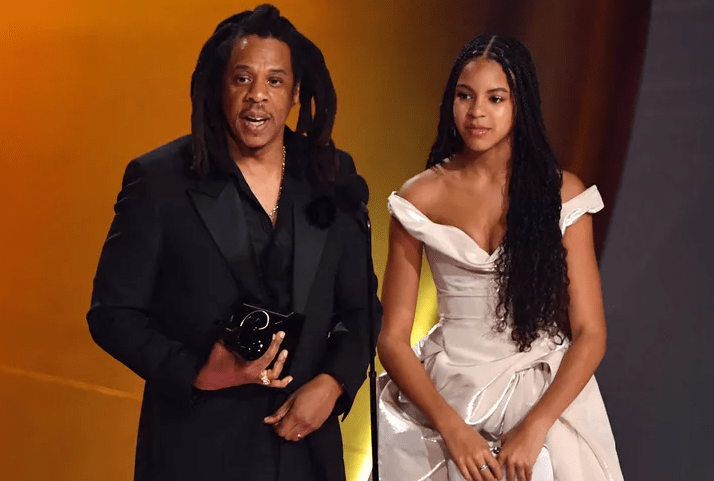 Jay Z accepted a Grammy award alongside his daughter Blue Ivy. Credit: VALERIE MACON/AFP VIA GETTY IMAGES