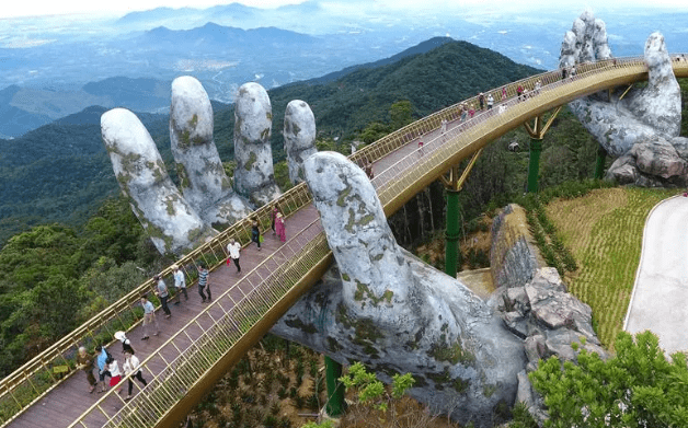 The Golden Bridge is a 150-metre-long pedestrian bridge in the Bà Nà Hills resort, near Da Nang, Vietnam. Credit: supplied.
