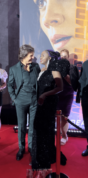 Tom Cruise with Suzan Mutesi at the Mission Impossible – Dead Reckoning premiere in Sydney in July 2023. Credit: supplied.