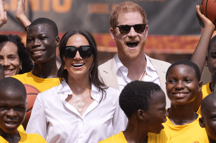Prince Harry and Meghan Markle during the Giant of Africa Foundation at the Dream Big Basketball clinic in Lagos Nigeria, Sunday, May 12, 2024. Credit: AP 