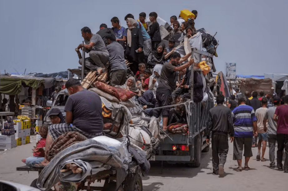 Palestinians fleeing from Rafah on May 28. Abdel Kreem Hana/AP
