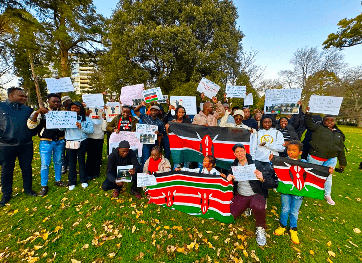 Members of the Kenyan community gathered in Melbourne on June 25th to protest Kenya’s finance bill 2024, which was recently passed by lawmakers. Credit: BACKCOVERNEWS.COM