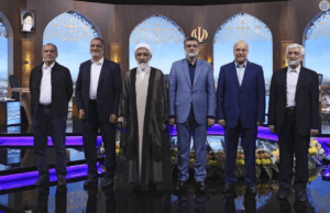 In this picture made available by Iranian state-run TV, IRIB, presidential candidates for June 28, election from left to right: Masoud Pezeshkian, Alireza Zakani, Mostafa Pourmohammadi, Amirhossein Ghazizadeh Hashemi, Mohammad Bagher Qalibaf, and Saeed Jalili pose for a photo after the conclusion of their debate at the TV studio in Tehran, Iran, Tuesday, June 25, 2024. (Morteza Fakhri Nezhad/IRIB via AP)