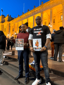 Kenyan MP hopeful Makena Mwita (right) and a friend joined protesters in Melbourne. Credit: supplied.