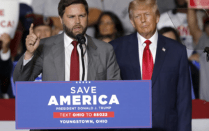 JD Vance is accompanied by former president Donald Trump as he speaks at a campaign rally in Youngstown, Ohio, on September 17, 2022. Credit: Tom E. Puskar, AP