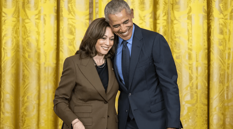 Former President Barack Obama hugs Vice President Kamala Harris during an Affordable Care Act event with President Joe Biden, Tuesday, April 5, 2022, in the East Room of the White House. (Official White House Photo by Adam Schultz)