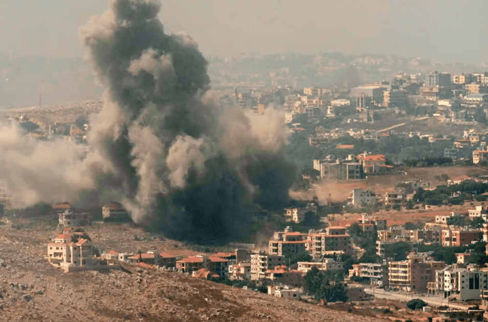 Smoke rises from Israeli air strikes in the southern village of Kfar Rouman, south Lebanon. Credit: Hussein Malla/AP Photo