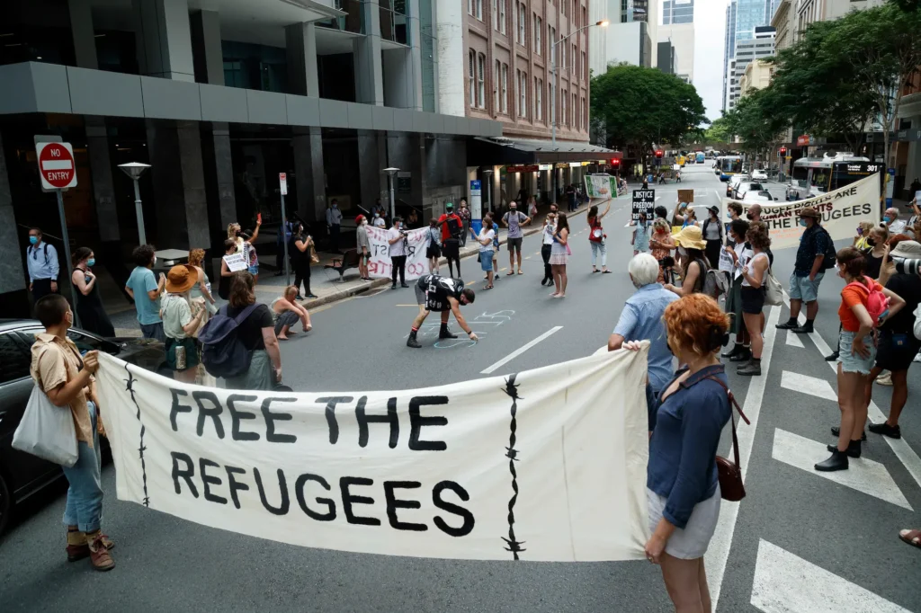 Activists gather in Brisbane's ANZAC Square to protest the indefinite detention of refugees and asylum seekers in Australian-run and funded facilities on the mainland and on Papua New Guinea's Manus Island, January 19, 2022. Credit: SOPA Images